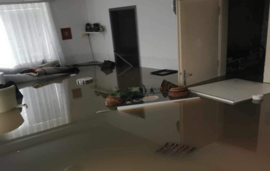 Poplavljen objekt. Foto vir: Slovenski karitas