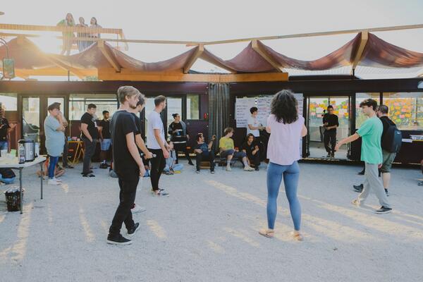 people infront of the bus
